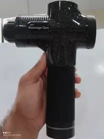 ماساژ تفنگی گان شارژی6 سر با موتور براشلس و باتری لیتیومی قابل شارژ